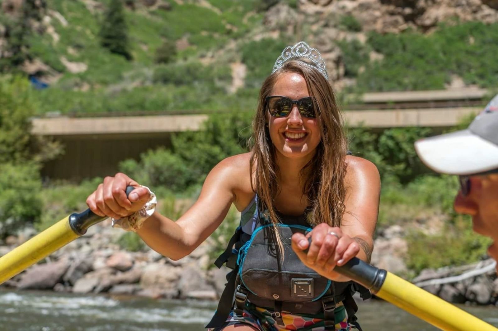 aspen-colorado–whitewater-rafting a person holding a baseball bat